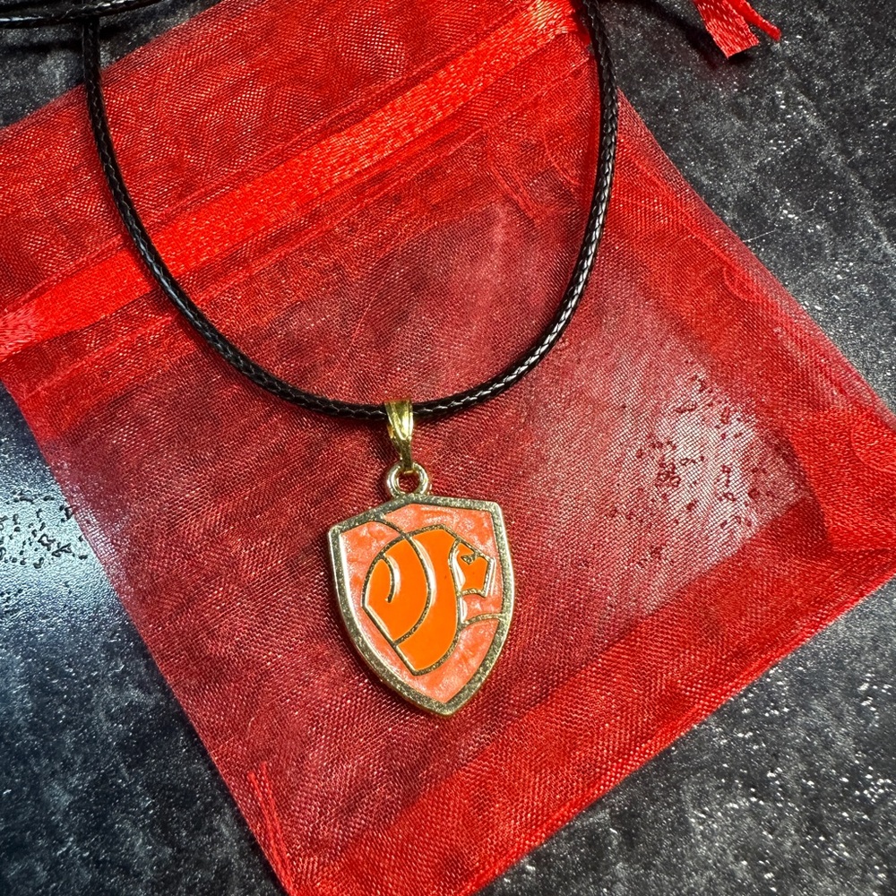 Orange Shield Pendant Necklace